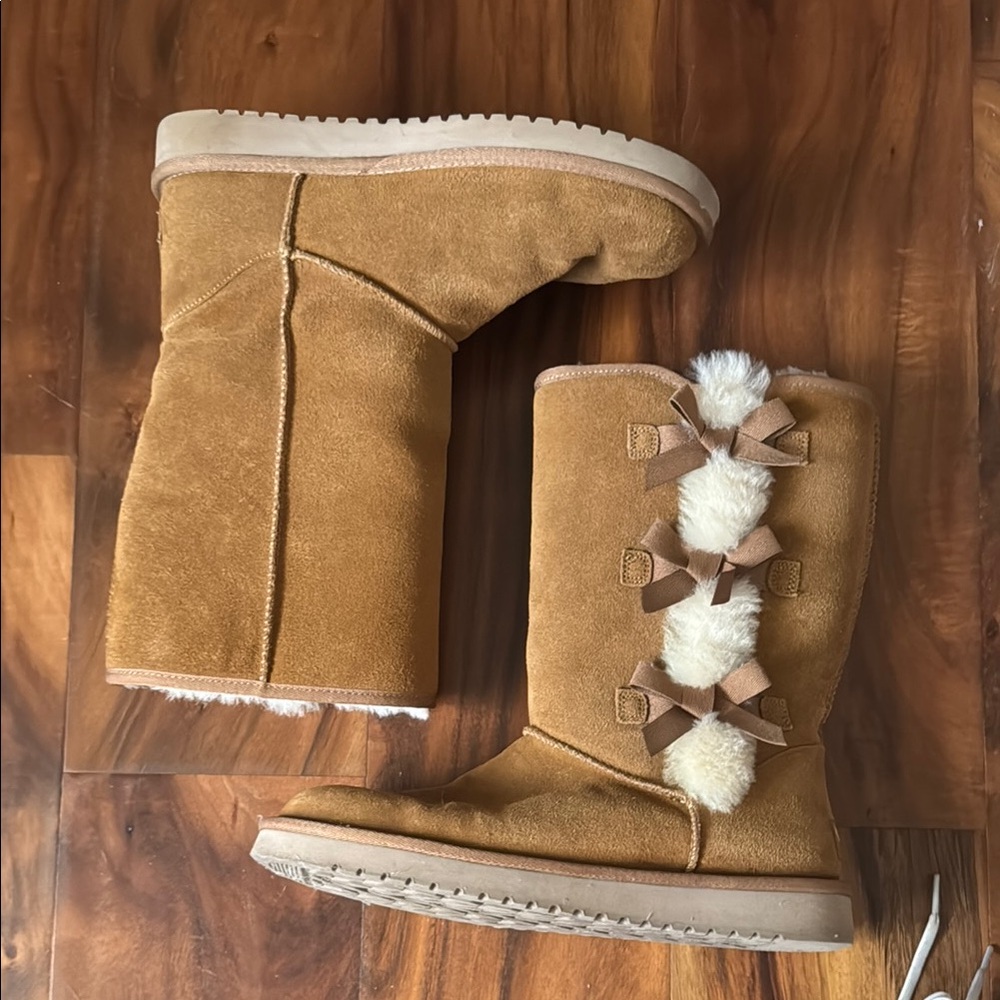 Tan Suede Boots with Bow and Pom Accents